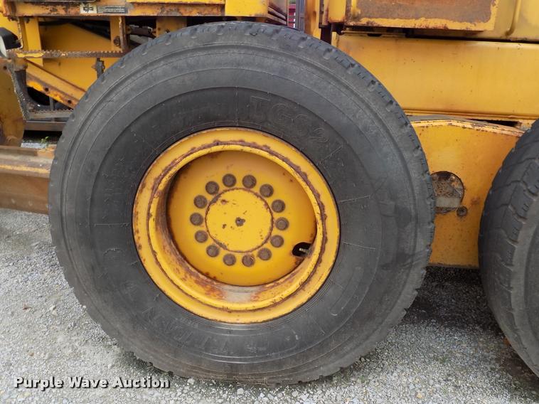 image for item DP9997 1999 John Deere 770CH  motor grader