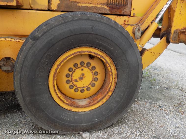 image for item DP9997 1999 John Deere 770CH  motor grader