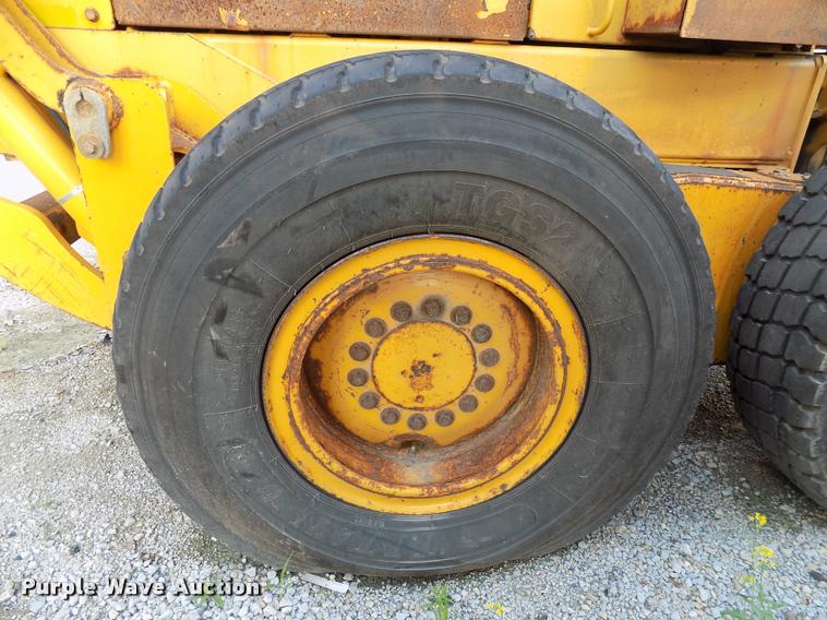 image for item DP9997 1999 John Deere 770CH  motor grader