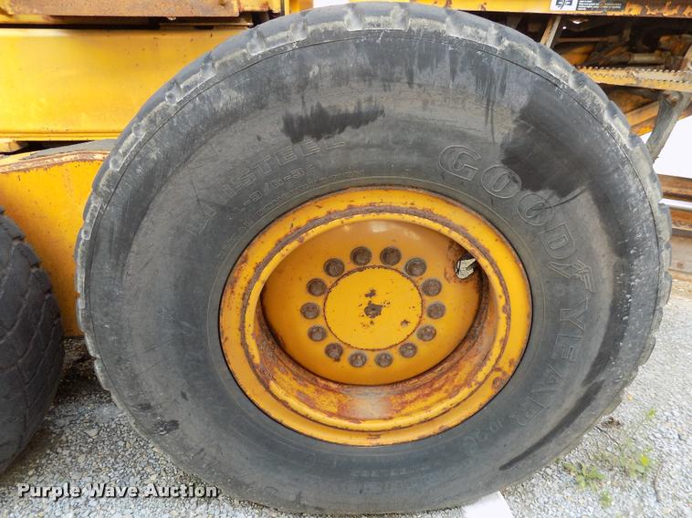 image for item DP9997 1999 John Deere 770CH  motor grader