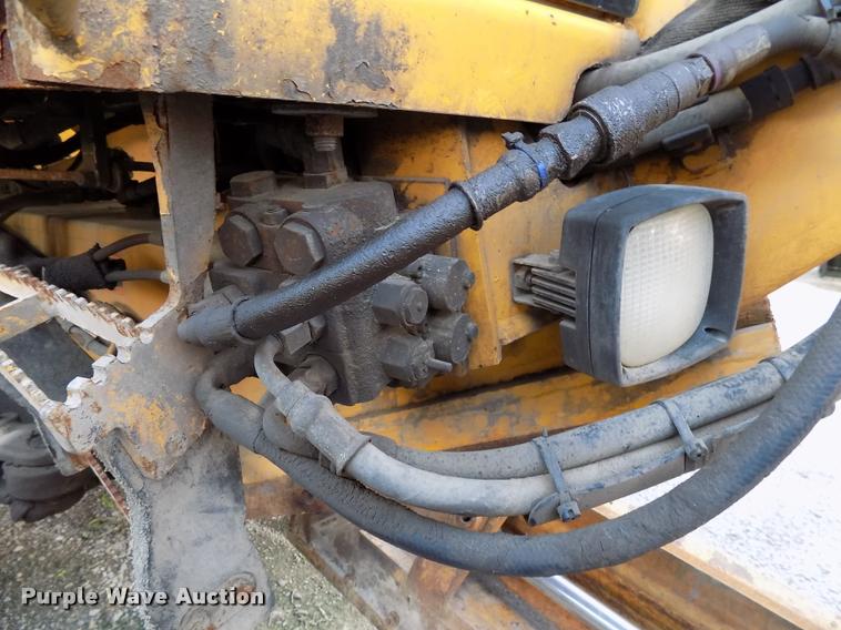 image for item DP9997 1999 John Deere 770CH  motor grader