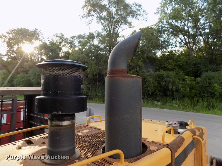 image for item DP9997 1999 John Deere 770CH  motor grader