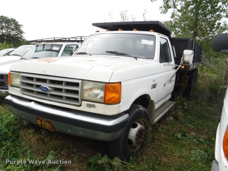 image for item K5883 1989 Ford F450 Super Duty XL flat dump bed truck