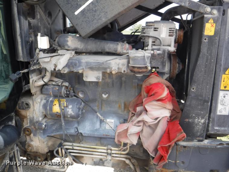 image for item K5899 2002 New Holland TS100 tractor