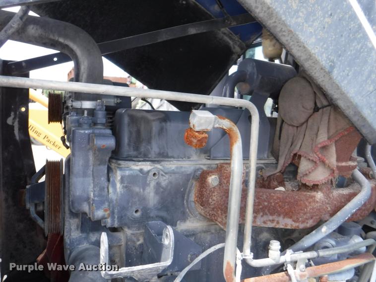 image for item K5899 2002 New Holland TS100 tractor