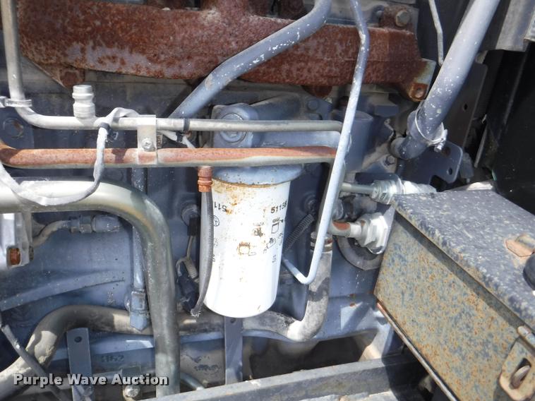 image for item K5899 2002 New Holland TS100 tractor