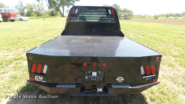 image for item DB3377 1999 Ford F350 Super Duty Crew Cab flatbed pickup truck