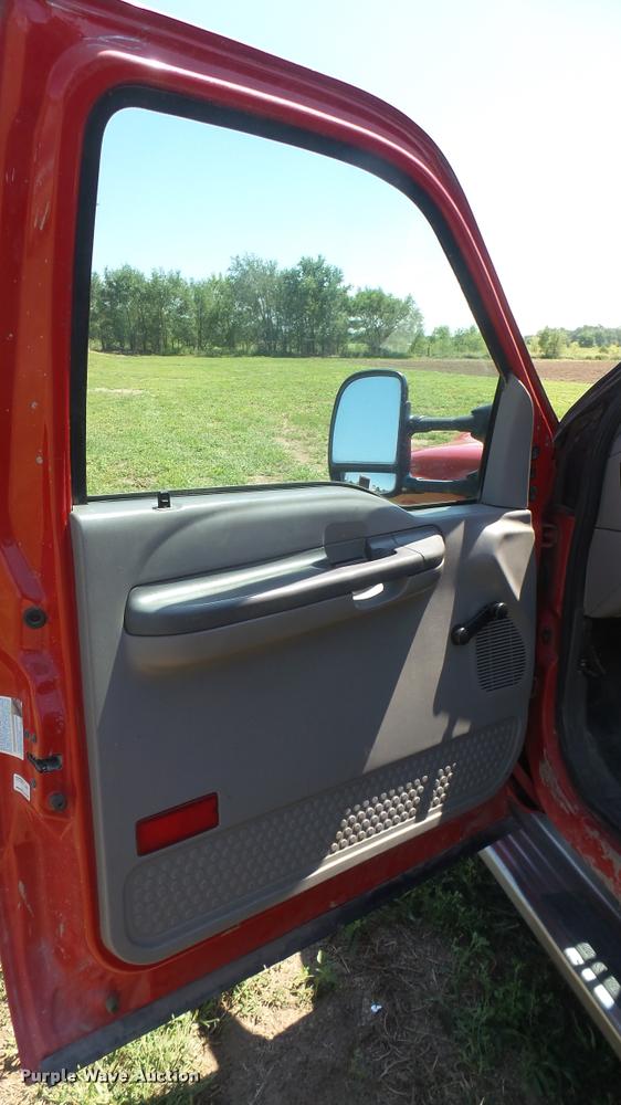 image for item DB3377 1999 Ford F350 Super Duty Crew Cab flatbed pickup truck