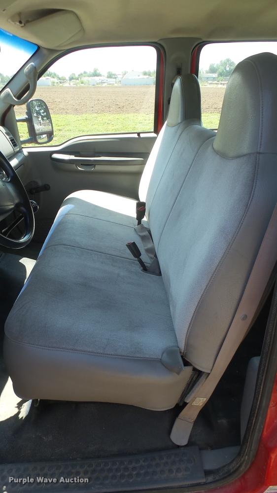 image for item DB3377 1999 Ford F350 Super Duty Crew Cab flatbed pickup truck