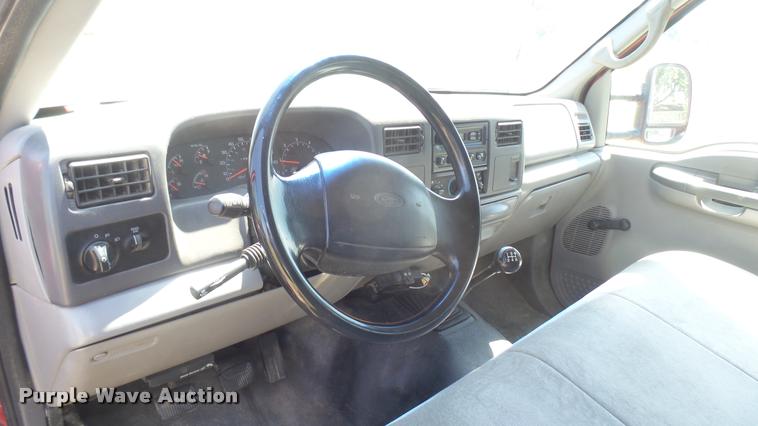 image for item DB3377 1999 Ford F350 Super Duty Crew Cab flatbed pickup truck