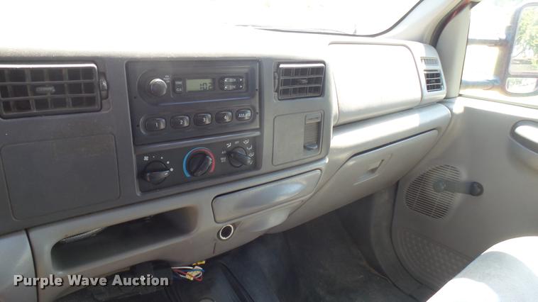 image for item DB3377 1999 Ford F350 Super Duty Crew Cab flatbed pickup truck