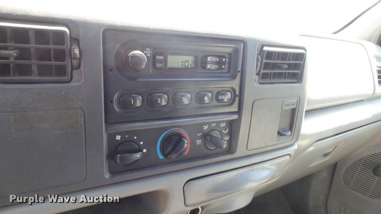 image for item DB3377 1999 Ford F350 Super Duty Crew Cab flatbed pickup truck