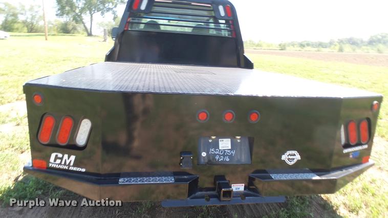 image for item DB3377 1999 Ford F350 Super Duty Crew Cab flatbed pickup truck