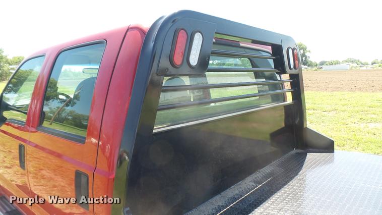 image for item DB3377 1999 Ford F350 Super Duty Crew Cab flatbed pickup truck