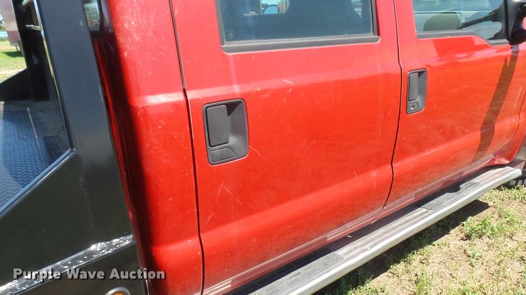 image for item DB3377 1999 Ford F350 Super Duty Crew Cab flatbed pickup truck