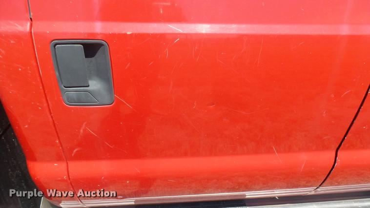 image for item DB3377 1999 Ford F350 Super Duty Crew Cab flatbed pickup truck