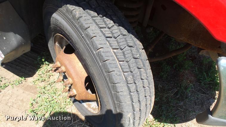 image for item DB3377 1999 Ford F350 Super Duty Crew Cab flatbed pickup truck