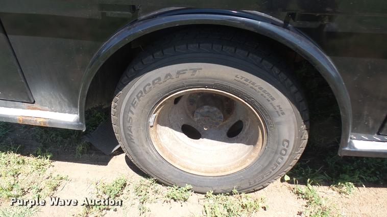 image for item DB3377 1999 Ford F350 Super Duty Crew Cab flatbed pickup truck