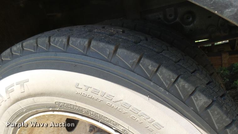 image for item DB3377 1999 Ford F350 Super Duty Crew Cab flatbed pickup truck