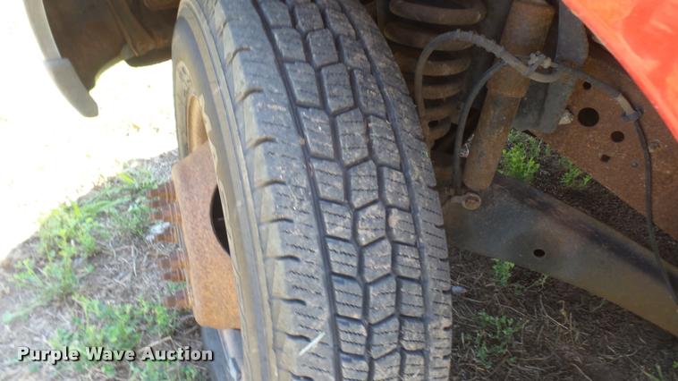 image for item DB3377 1999 Ford F350 Super Duty Crew Cab flatbed pickup truck