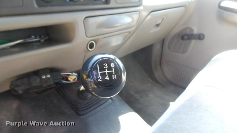 image for item DB3377 1999 Ford F350 Super Duty Crew Cab flatbed pickup truck