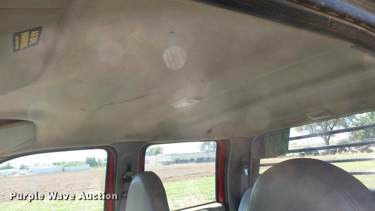 image for item DB3377 1999 Ford F350 Super Duty Crew Cab flatbed pickup truck