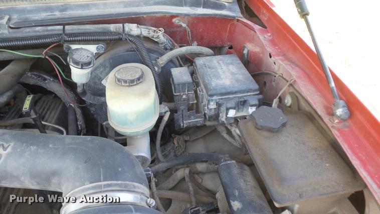 image for item DB3377 1999 Ford F350 Super Duty Crew Cab flatbed pickup truck