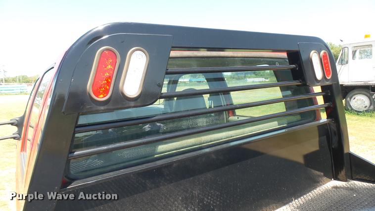 image for item DB3377 1999 Ford F350 Super Duty Crew Cab flatbed pickup truck