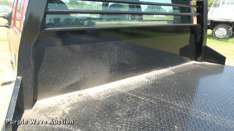 image for item DB3377 1999 Ford F350 Super Duty Crew Cab flatbed pickup truck