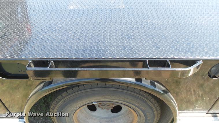 image for item DB3377 1999 Ford F350 Super Duty Crew Cab flatbed pickup truck