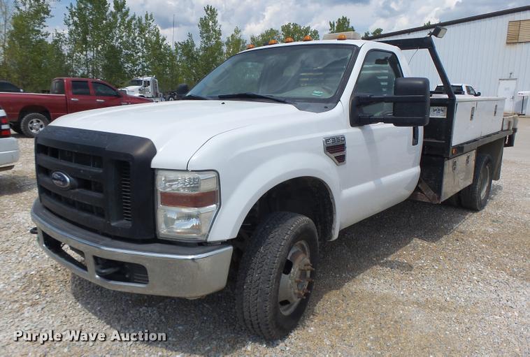 image for item DB5858 2009 Ford F350 Super Duty flatbed pickup truck
