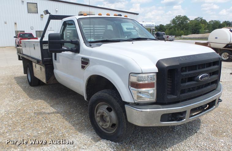 image for item DB5858 2009 Ford F350 Super Duty flatbed pickup truck