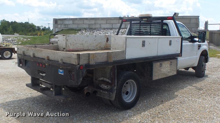 image for item DB5858 2009 Ford F350 Super Duty flatbed pickup truck