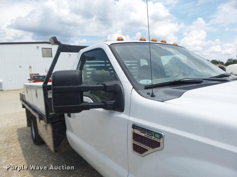 image for item DB5858 2009 Ford F350 Super Duty flatbed pickup truck
