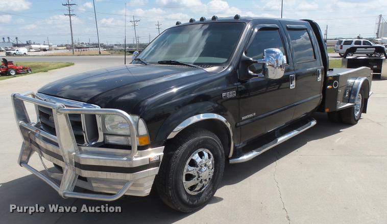 image for item DC3979 2003 Ford F350 Super Duty XLT Lariat Edge Crew Cab flatbed pickup truck