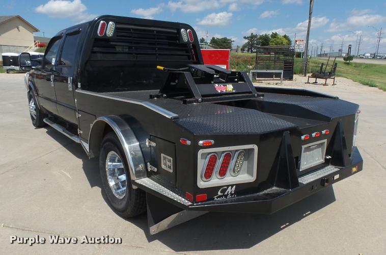 image for item DC3979 2003 Ford F350 Super Duty XLT Lariat Edge Crew Cab flatbed pickup truck