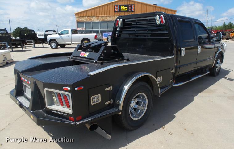 image for item DC3979 2003 Ford F350 Super Duty XLT Lariat Edge Crew Cab flatbed pickup truck