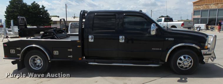 image for item DC3979 2003 Ford F350 Super Duty XLT Lariat Edge Crew Cab flatbed pickup truck