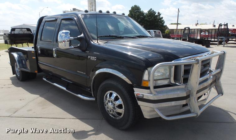 image for item DC3979 2003 Ford F350 Super Duty XLT Lariat Edge Crew Cab flatbed pickup truck