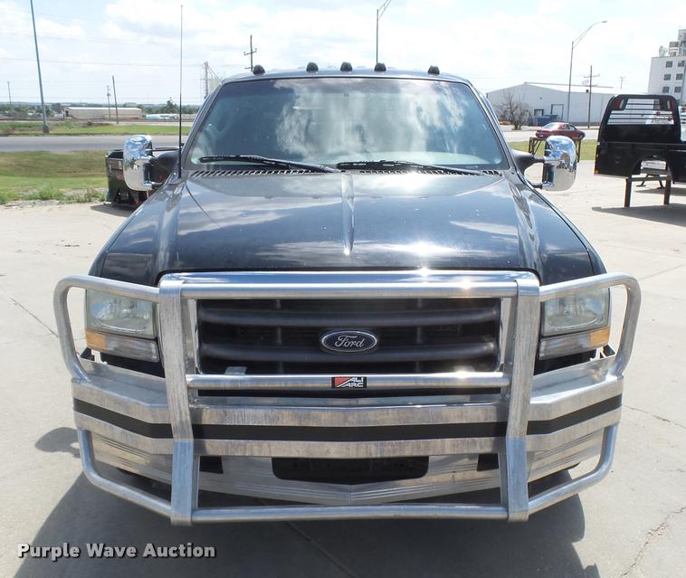 image for item DC3979 2003 Ford F350 Super Duty XLT Lariat Edge Crew Cab flatbed pickup truck