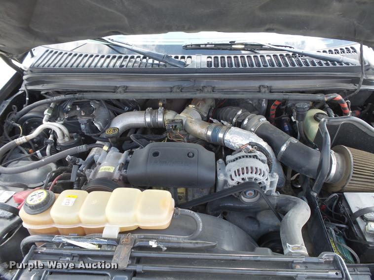 image for item DC3979 2003 Ford F350 Super Duty XLT Lariat Edge Crew Cab flatbed pickup truck