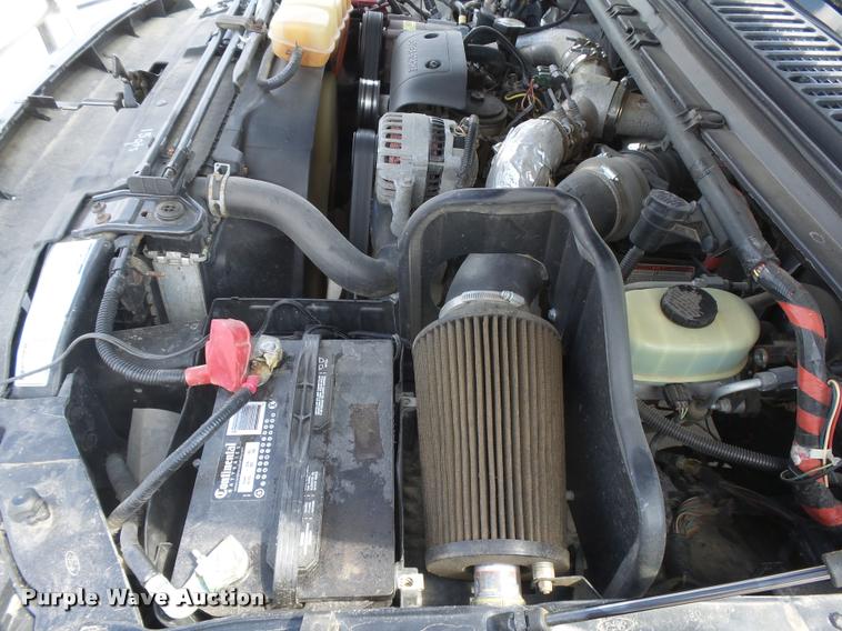 image for item DC3979 2003 Ford F350 Super Duty XLT Lariat Edge Crew Cab flatbed pickup truck