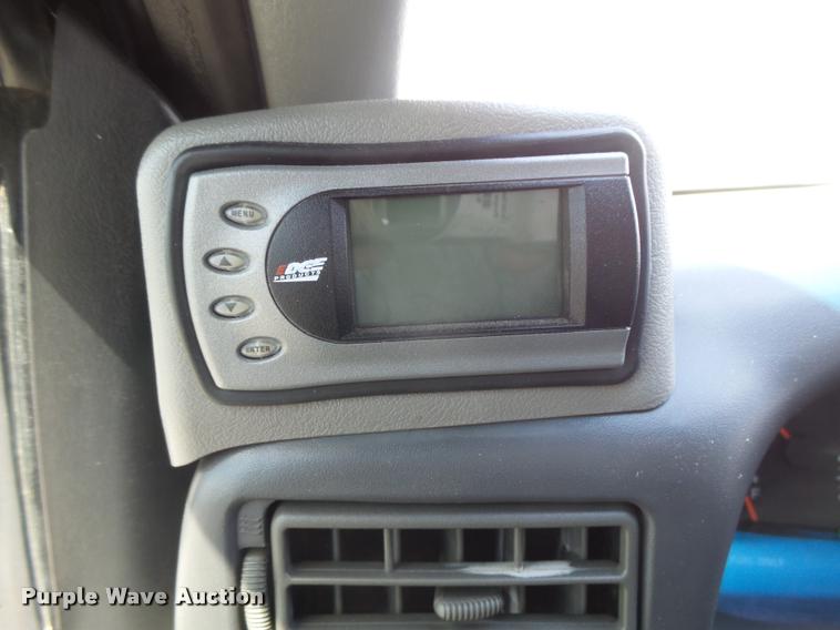 image for item DC3979 2003 Ford F350 Super Duty XLT Lariat Edge Crew Cab flatbed pickup truck