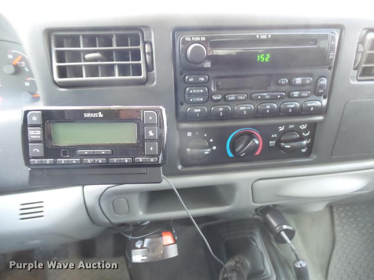 image for item DC3979 2003 Ford F350 Super Duty XLT Lariat Edge Crew Cab flatbed pickup truck