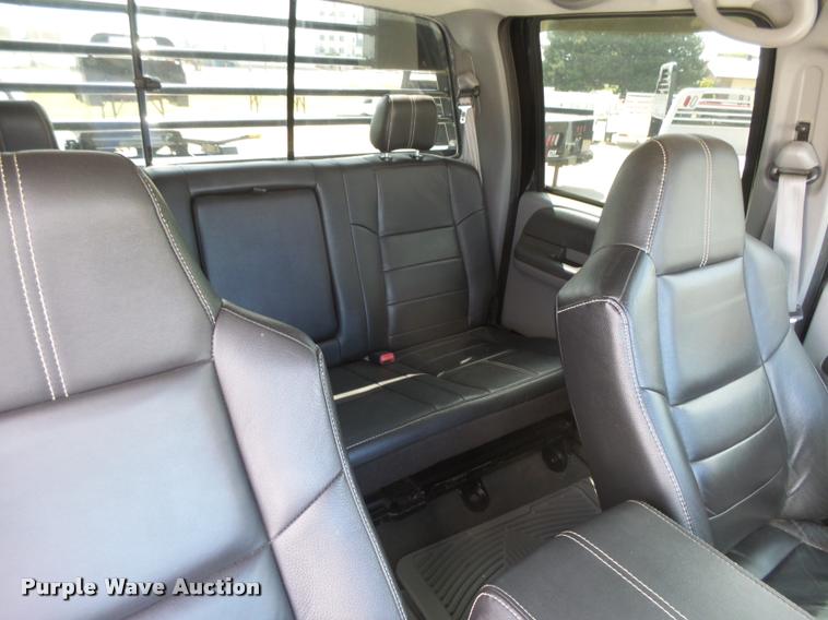 image for item DC3979 2003 Ford F350 Super Duty XLT Lariat Edge Crew Cab flatbed pickup truck