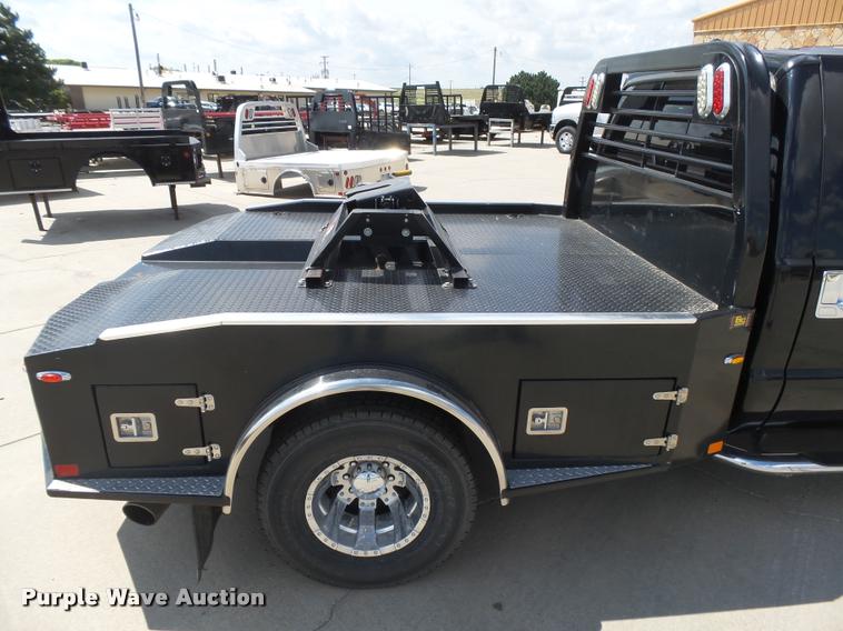 image for item DC3979 2003 Ford F350 Super Duty XLT Lariat Edge Crew Cab flatbed pickup truck