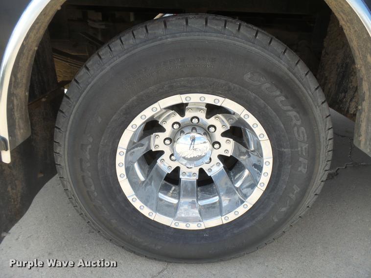 image for item DC3979 2003 Ford F350 Super Duty XLT Lariat Edge Crew Cab flatbed pickup truck