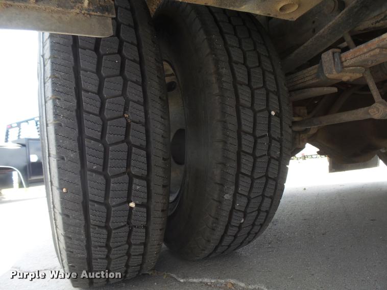 image for item DC3979 2003 Ford F350 Super Duty XLT Lariat Edge Crew Cab flatbed pickup truck