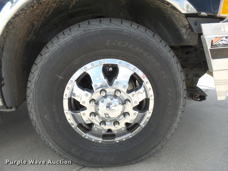 image for item DC3979 2003 Ford F350 Super Duty XLT Lariat Edge Crew Cab flatbed pickup truck