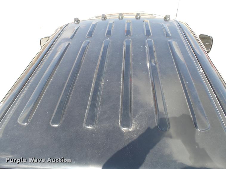 image for item DC3979 2003 Ford F350 Super Duty XLT Lariat Edge Crew Cab flatbed pickup truck